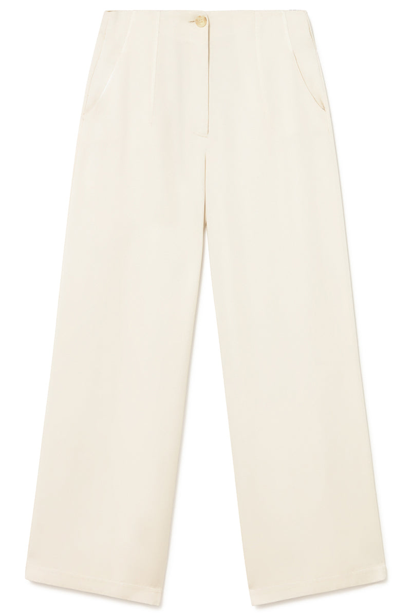 off White linen pants on a white background