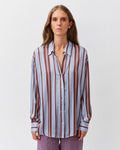 Woman wearing a striped shirt on a white background