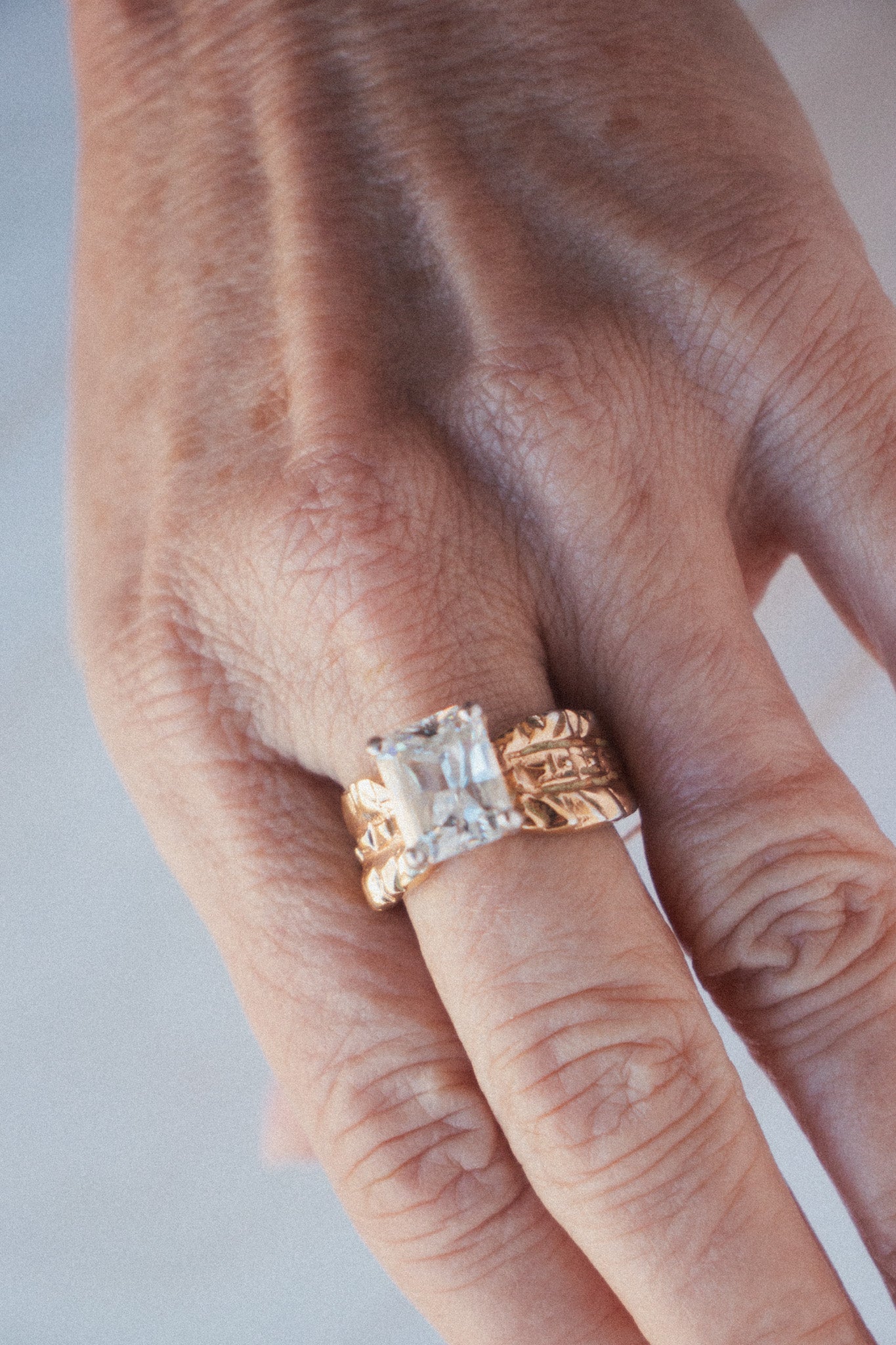 Vintage brutalist gold band/emerald diamond