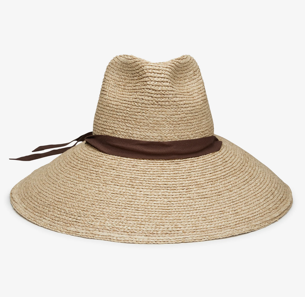 Beige straw hat with a brown band on a white background