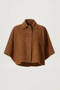Brown cape-style jacket on a light gray background