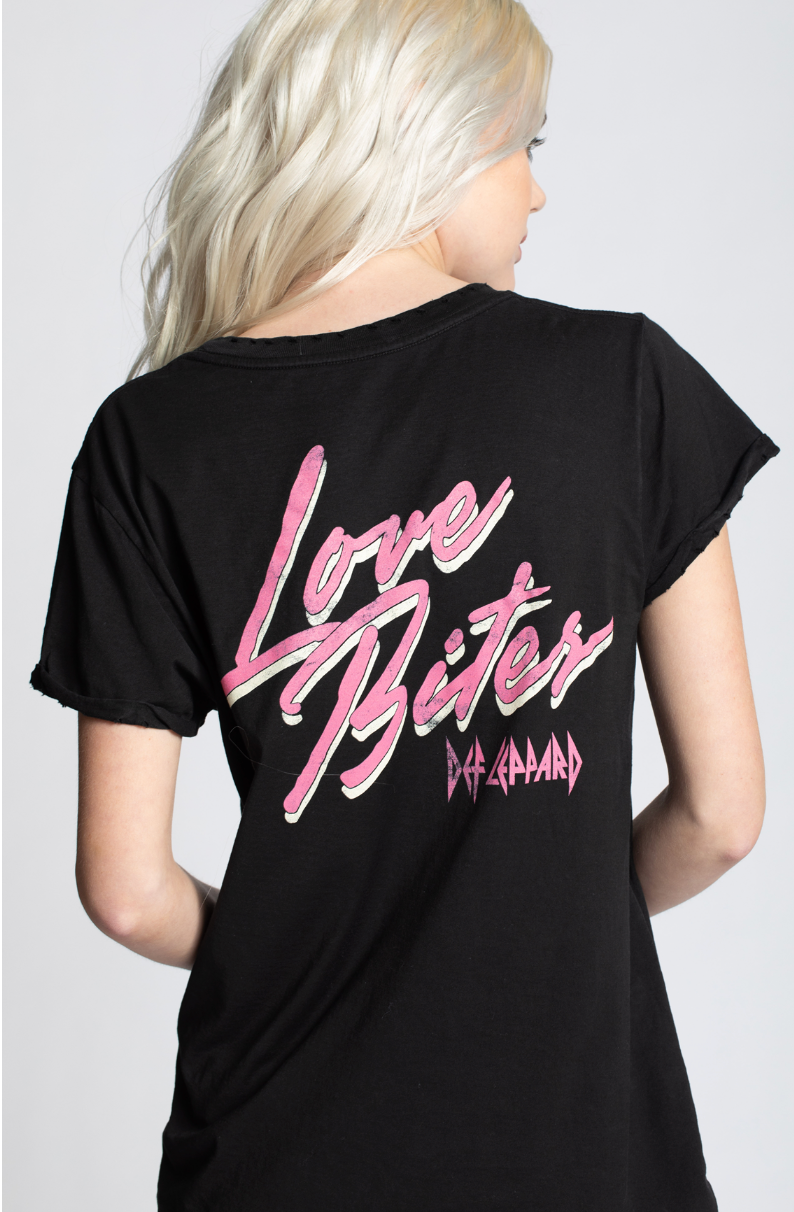 Black t-shirt with pink 'Love Bites' text on a plain background