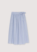 Light blue skirt with a tie waist on a light gray background