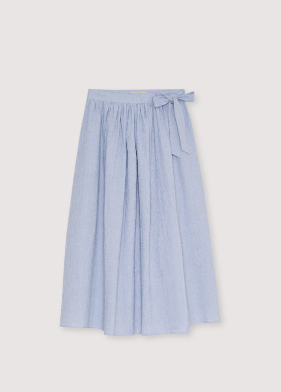 Light blue skirt with a tie waist on a light gray background
